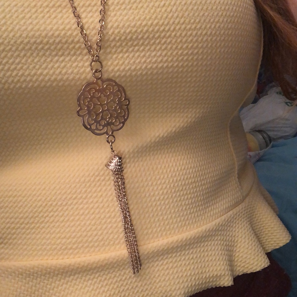 Long gold necklace statement piece